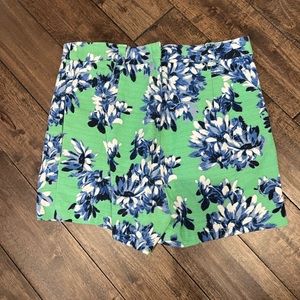 Green floral high-waisted dress shorts